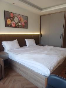 Ένα ή περισσότερα κρεβάτια σε δωμάτιο στο Studio apartment in Suntwilight near to expomart