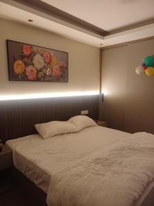 Ένα ή περισσότερα κρεβάτια σε δωμάτιο στο Studio apartment in Suntwilight near to expomart