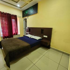 Ένα ή περισσότερα κρεβάτια σε δωμάτιο στο Rocvista villas