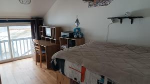 Ένα ή περισσότερα κρεβάτια σε δωμάτιο στο Maison Rabat les 3 seigneurs