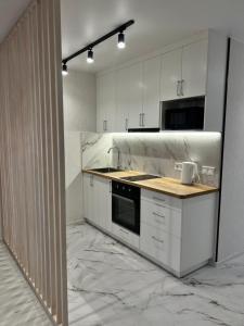 Kuchyň nebo kuchyňský kout v ubytování Start Life