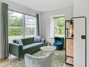 Χώρος καθιστικού στο Great holiday home energy neutral on Texel with sauna and sun shower