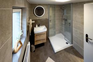 Koupelna v ubytování kleines Haus + 10 fotografií
