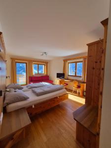 Postel nebo postele na pokoji v ubytování Hotel Restaurant Raunig