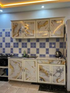 Kuchyň nebo kuchyňský kout v ubytování Tataicha Stydio 1 + 28 fotografií