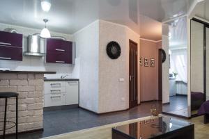 a kitchen with a counter top in a room at Exclusive apartment at the in Mykolaiv
