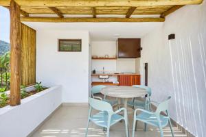 Køkken eller tekøkken på Villa da Barra Ubatuba