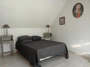 Postel nebo postele na pokoji v ubytování Gîte du Palais