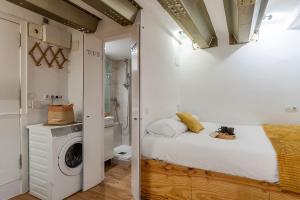 Giường trong phòng chung tại 2537 - AB Sant Antoni Studio