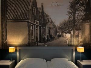 Ένα ή περισσότερα κρεβάτια σε δωμάτιο στο In de Kathoek - Beste voorwaarden via eigen kanaal