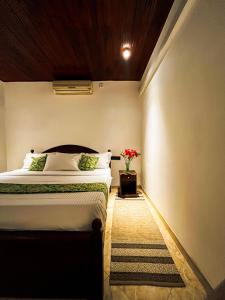 Ένα ή περισσότερα κρεβάτια σε δωμάτιο στο Sakura House