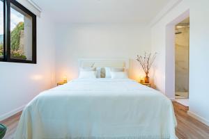 Ένα ή περισσότερα κρεβάτια σε δωμάτιο στο Nobregas Lodge +16 φωτογραφίες