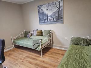 a bedroom with two bunk beds and a bedskirts at Seegarten in Görlitz