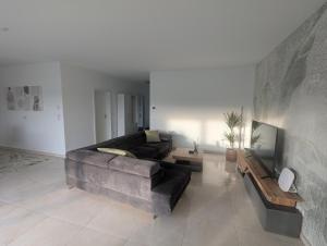 Χώρος καθιστικού στο Ruhiges Apartment im Grünen Kreischa bei Dresden