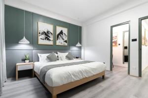 Ένα ή περισσότερα κρεβάτια σε δωμάτιο στο Modern 2 Bedroom Apartment in Central Kathmandu near Thamel & Airport 3