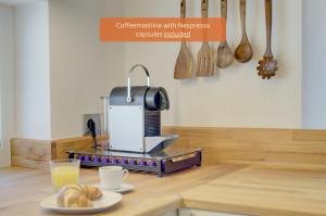 Příslušenství pro přípravu čaje a kávy v ubytování Bungalow - Kinderspielplatz - Garten mit Feuerstelle