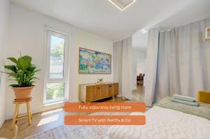 Postel nebo postele na pokoji v ubytování Bungalow - Kinderspielplatz - Garten mit Feuerstelle