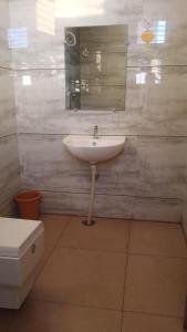 Ένα μπάνιο στο Aakruthi Homestay