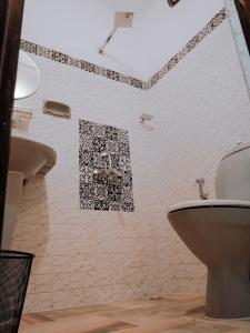 Koupelna v ubytování Scarlet's Inn