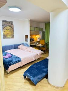 Voodi või voodid majutusasutuse Уют в Центре на Арбате рядом с метро toas