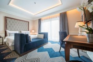 Postel nebo postele na pokoji v ubytování Boutique Hotel La Roche
