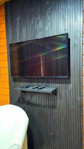 Et tv og/eller underholdning på Chácara Caminho do Paraíso