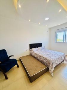 En eller flere senge i et værelse på Rio grande apartamento Silva paes 374