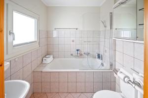 Ένα μπάνιο στο Appartement 2 à 4 personnes au centre du village +24 φωτογραφίες