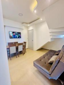 Et tv og/eller underholdning på Rio grande apartamento Silva paes 374