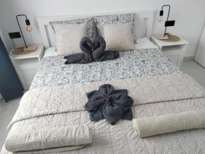 Postel nebo postele na pokoji v ubytování Casa Mario Ocean View + 20 fotografií