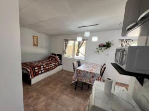 Postel nebo postele na pokoji v ubytování La casita the Aye