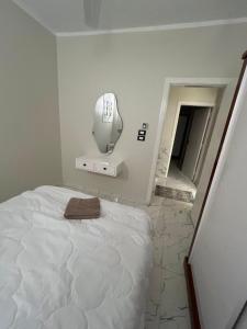 a bedroom with a bed and a mirror on the wall at ElMena House Luxor in Luxor +89 photos