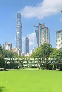 a sign in a park with a city in the background at iHome-Lujiazui Riverside, Authentic Shanghai Living As Pictured - Committed to Quality, Bund RiverView&CityWalk, Deluxe Neighborhood in Shanghai