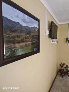 Μια τηλεόραση ή/και κέντρο ψυχαγωγίας στο Habakkuk Guesthouse +35 φωτογραφίες