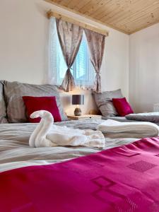 Postel nebo postele na pokoji v ubytování Apartmány u náměstí