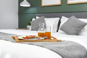 Ένα ή περισσότερα κρεβάτια σε δωμάτιο στο Premium 2 Bedroom Apartment in Central Kathmandu Close to Airport & Thamel 4 +37 φωτογραφίες