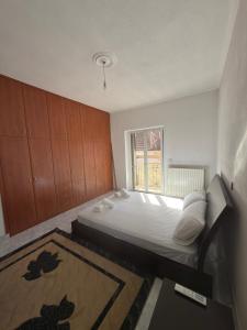 Postel nebo postele na pokoji v ubytování Άνετη Κατοικία για Απόδραση στη Λίμνη Πλαστήρα + 27 fotografií