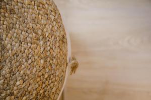 a close up of a straw hat at IRIS Boutique Rooms in Korinthos