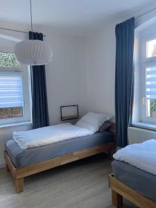 Postel nebo postele na pokoji v ubytování Ferienwohnung Fam. Falk