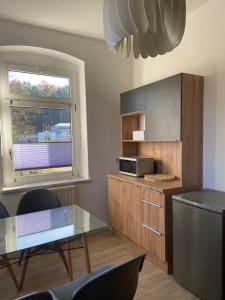 Kuchyň nebo kuchyňský kout v ubytování Ferienwohnung Fam. Falk