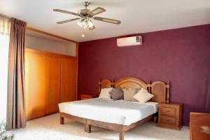 Postel nebo postele na pokoji v ubytování Casa Colibrí - Amplia cómoda en zona tranquila y bien conectada