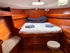 a small bed in the back of a boat at blu in Cagliari