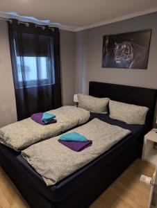 Ένα ή περισσότερα κρεβάτια σε δωμάτιο στο Stadtnah an der Förde 7 HH L 1OG