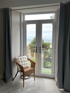 Istumisnurk majutusasutuses Craigievar Cottage Skelmorlie