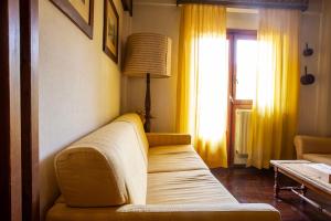 Postel nebo postele na pokoji v ubytování - 5 min Impianti da Sci - Appartamento in Residence