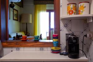 Kuchyň nebo kuchyňský kout v ubytování - 5 min Impianti da Sci - Appartamento in Residence