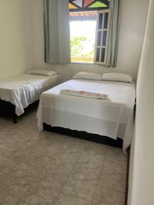 Ένα ή περισσότερα κρεβάτια σε δωμάτιο στο Casa Verde Experience