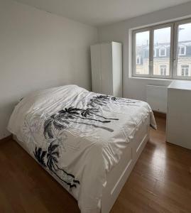 Voodi või voodid majutusasutuse La Coloc' toas