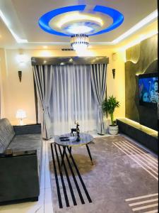 Χώρος καθιστικού στο Omnia Luxe Villa