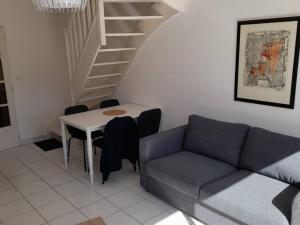 Posezení v ubytování Charmante maison de plage à Merlimont - 6 personnes, terrasse et WIFI - FR-1-672-39